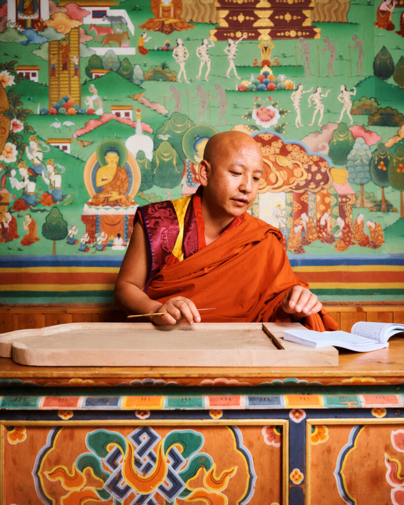 Lama-or-monk-of-astrology-college-of-Bhutan-providing-astrology-services