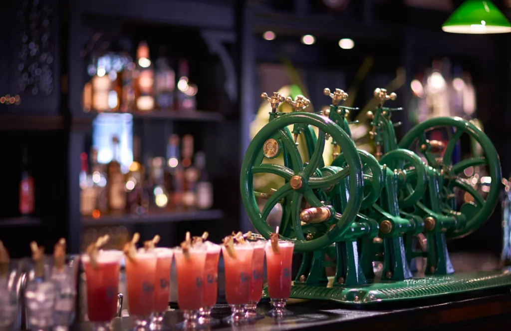 Long Bar in Raffles Singapore is home to Singapore Sling and the cast-iron Sling Shaker Machine.