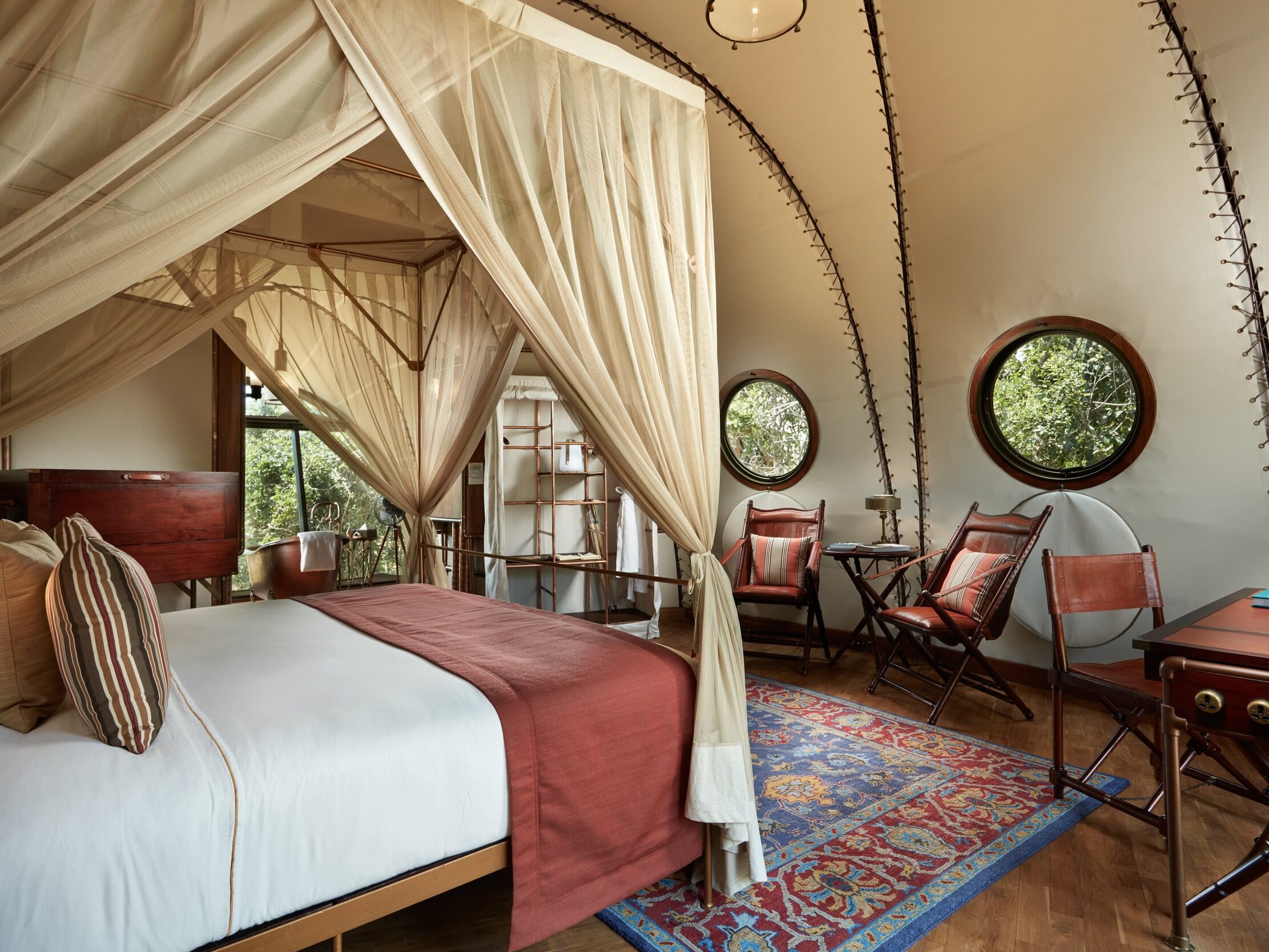 Twenty luxurious tents, each raised on teak platforms, are laid out to maximize privacy and views. The interiors are airy. You feel cocooned and immersed in the wild at the same time.