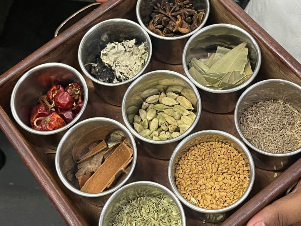 Chettinad kitchen essentials: Peppercorns, star anise, dry red chilies, fenugreek, cinnamon, 
fennel, bay leaf, cardamom, clove, and cumin — the aromatic backbone of the region’s 
legendary cuisine.