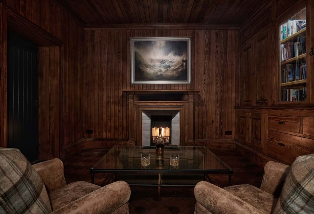 The sitting room is made for long conversations with fireplaces to keep you warm. The library brings a sense of calm. Photo courtesy: Farlam Hall 